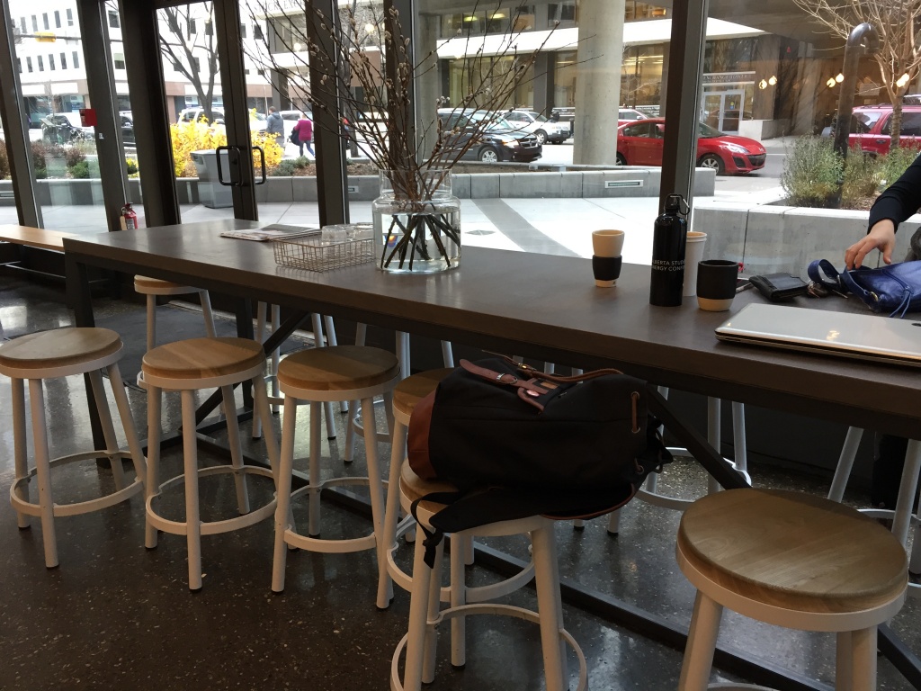 Love this community table with stools!